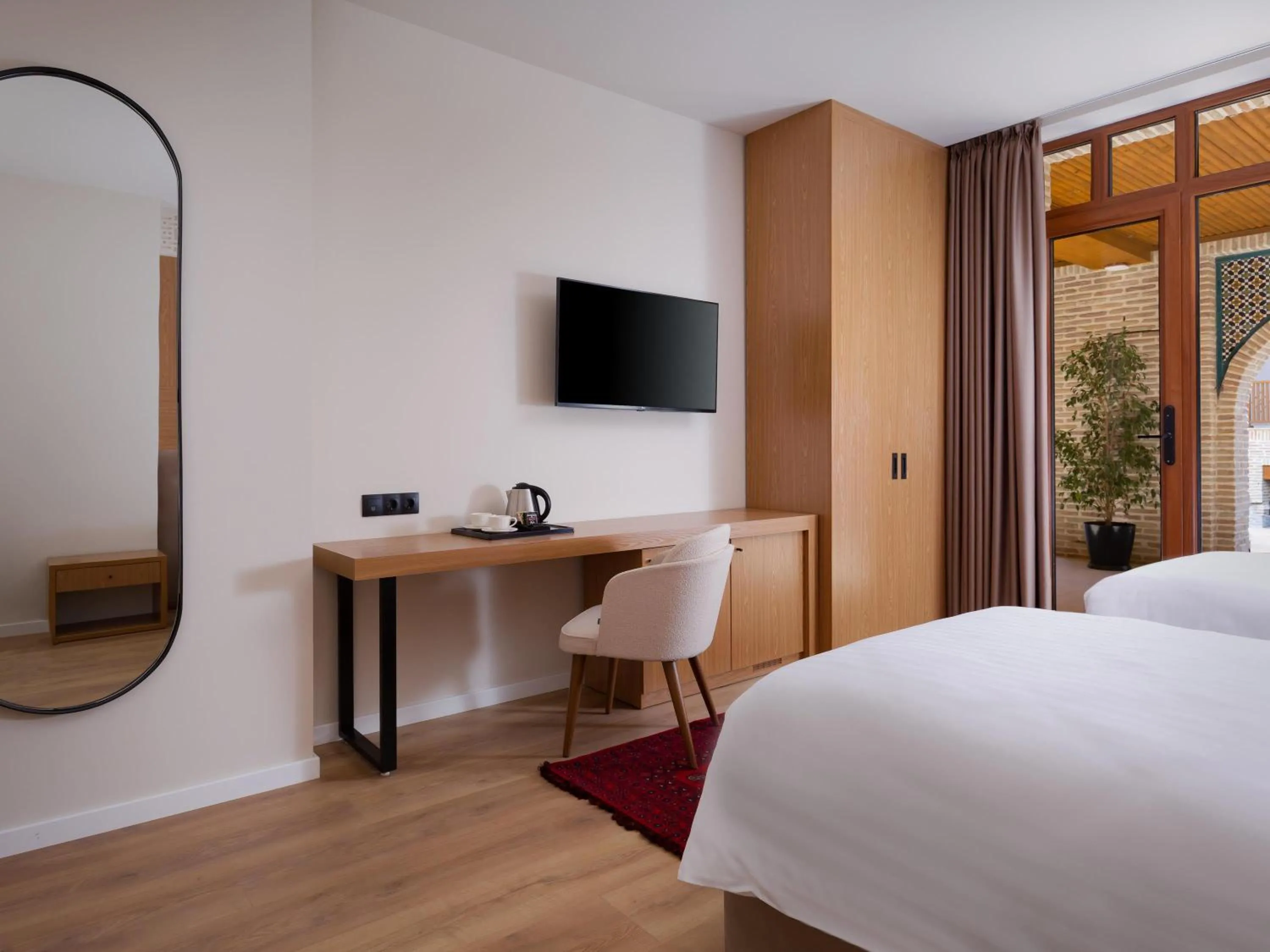 Classic Superior Room with One Double Bed and One Single Bed - single occupancy in Mercure Bukhara Old Town