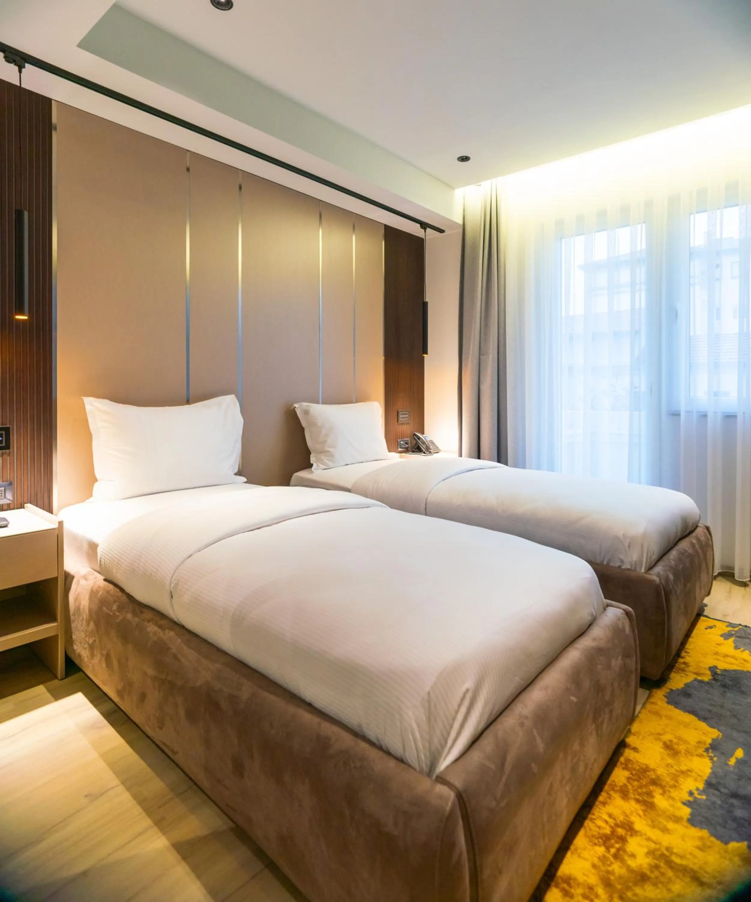 Twin Room with Balcony - single occupancy in Emery Hotel