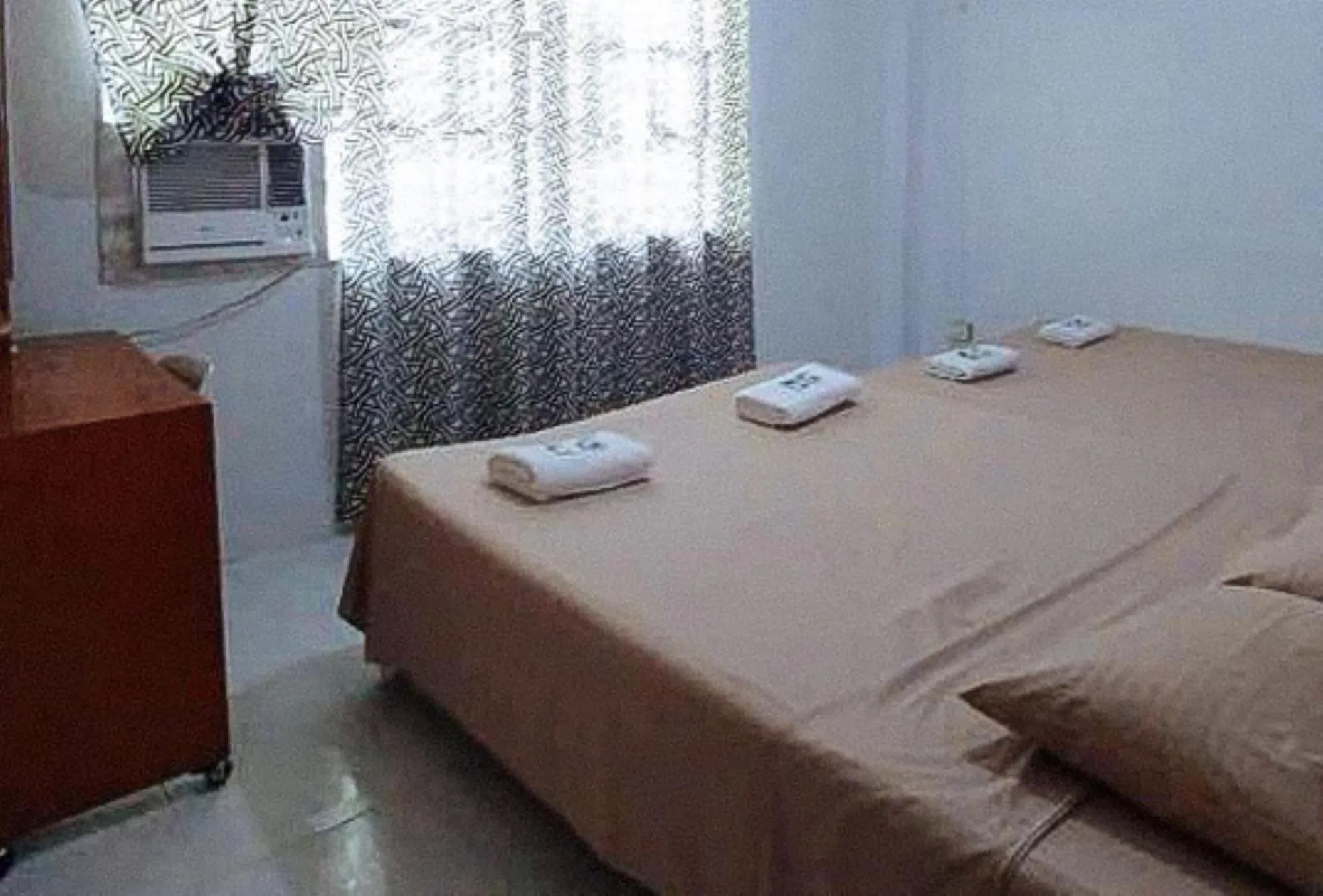 Family Room with Shared Bathroom in Sinoben Apartments by RedDoorz