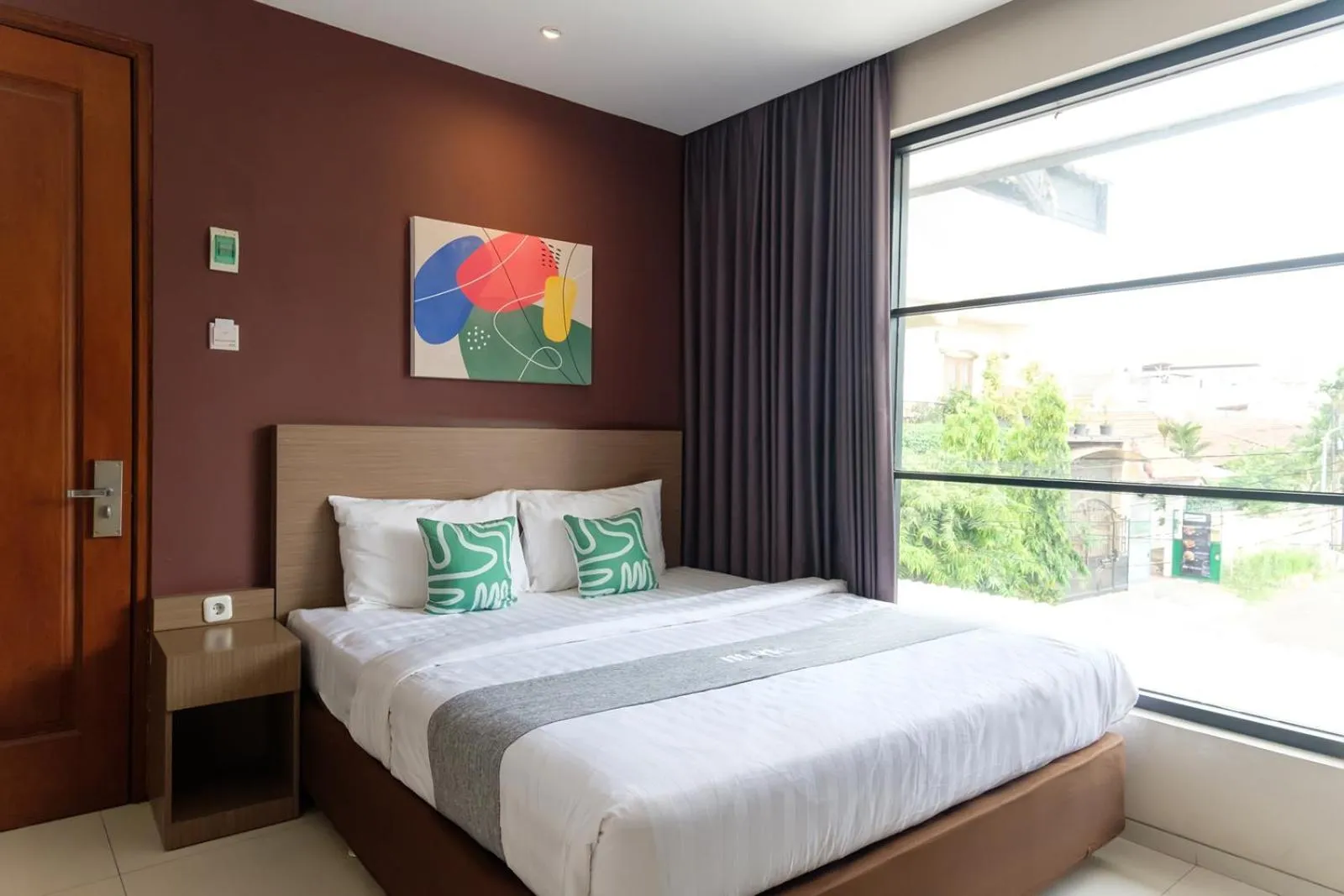 Deluxe Queen Room in Mono Coliving Kencana, Surabaya
