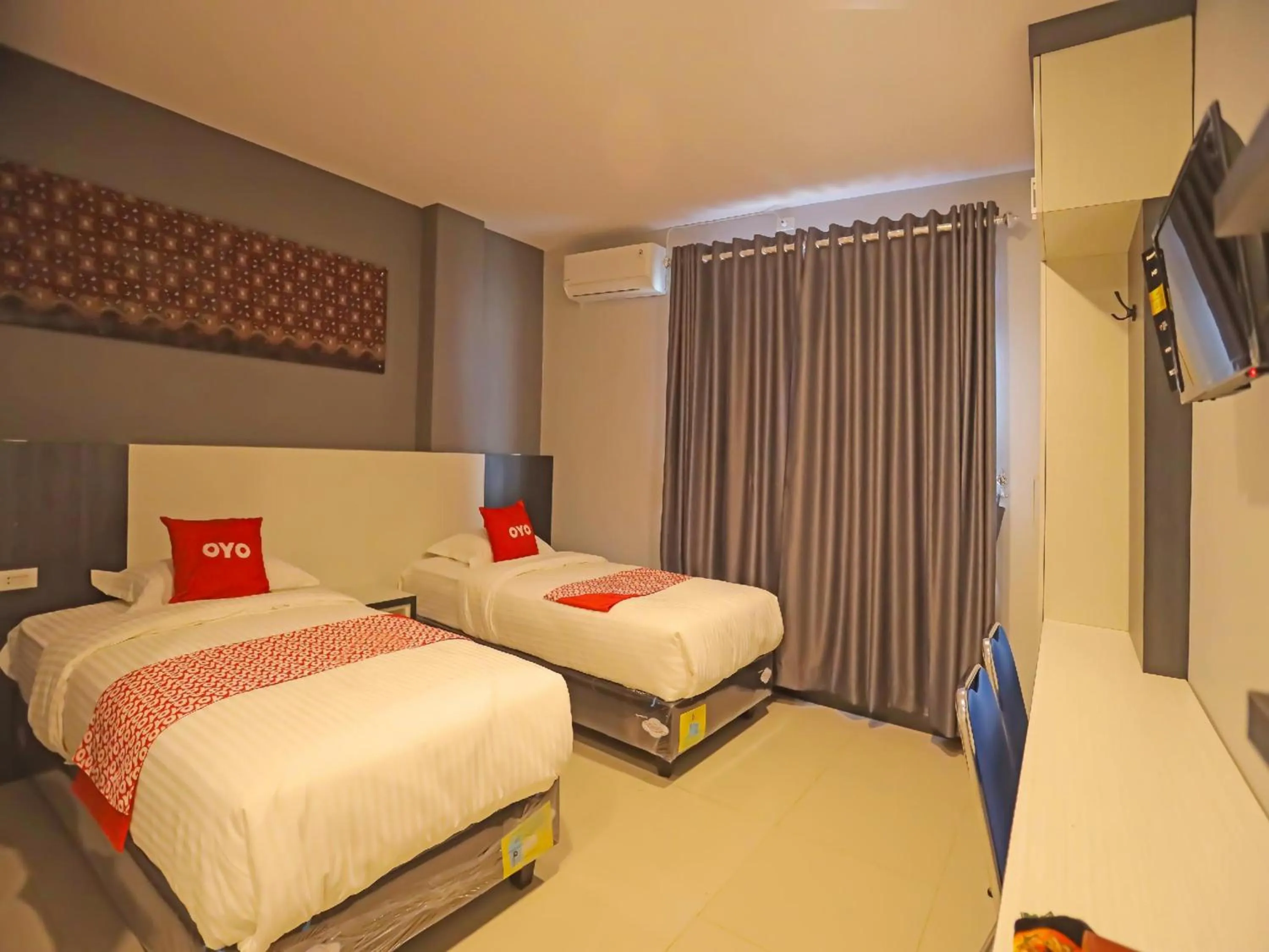 Delxue Twin Room in Capital O 92096 Kuala Ulee Lheue Residence Syariah