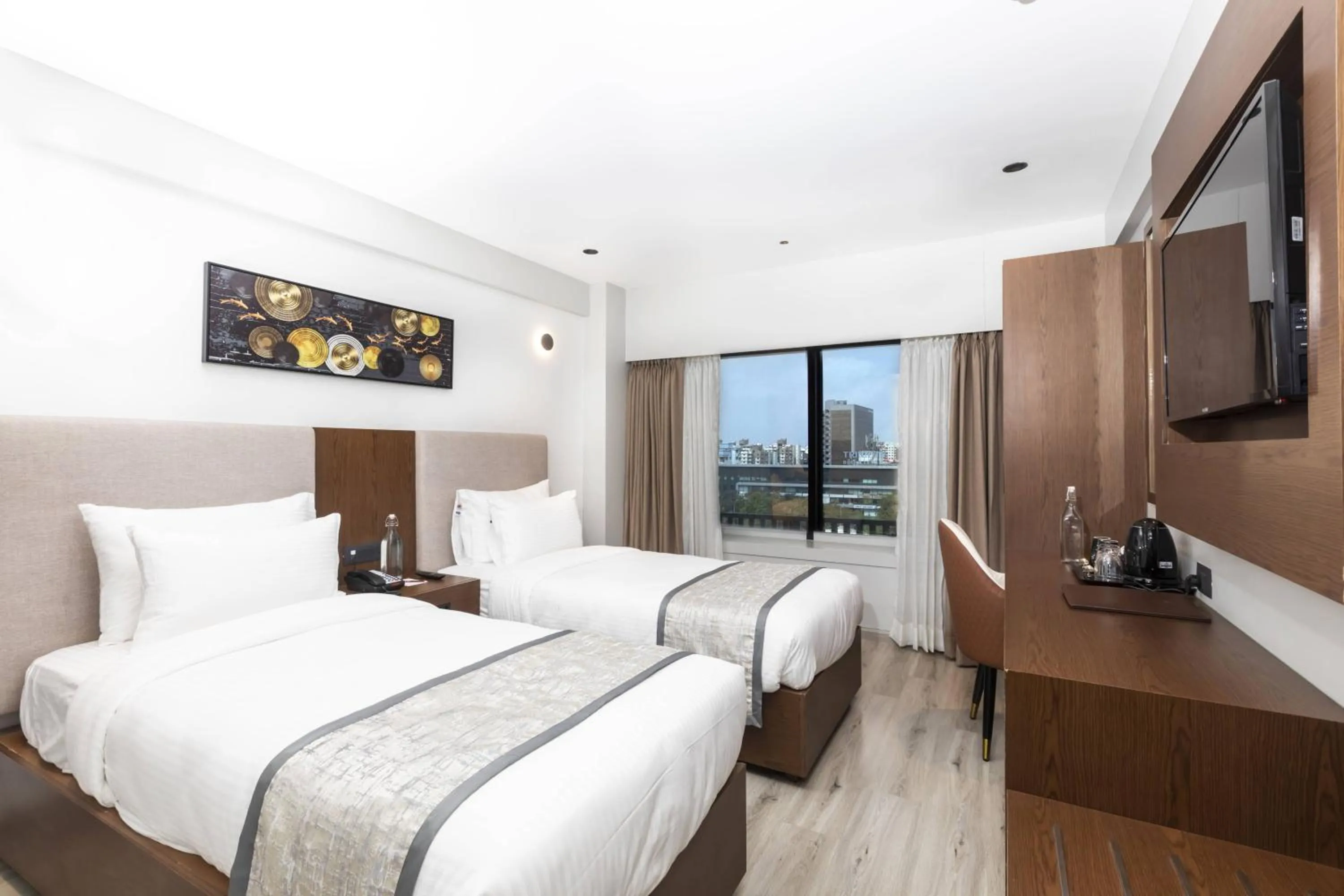 Superior Twin Room (15% off on 2-way Airport Transfer, F&B Services, Laundry) - single occupancy in Ramee International Surat