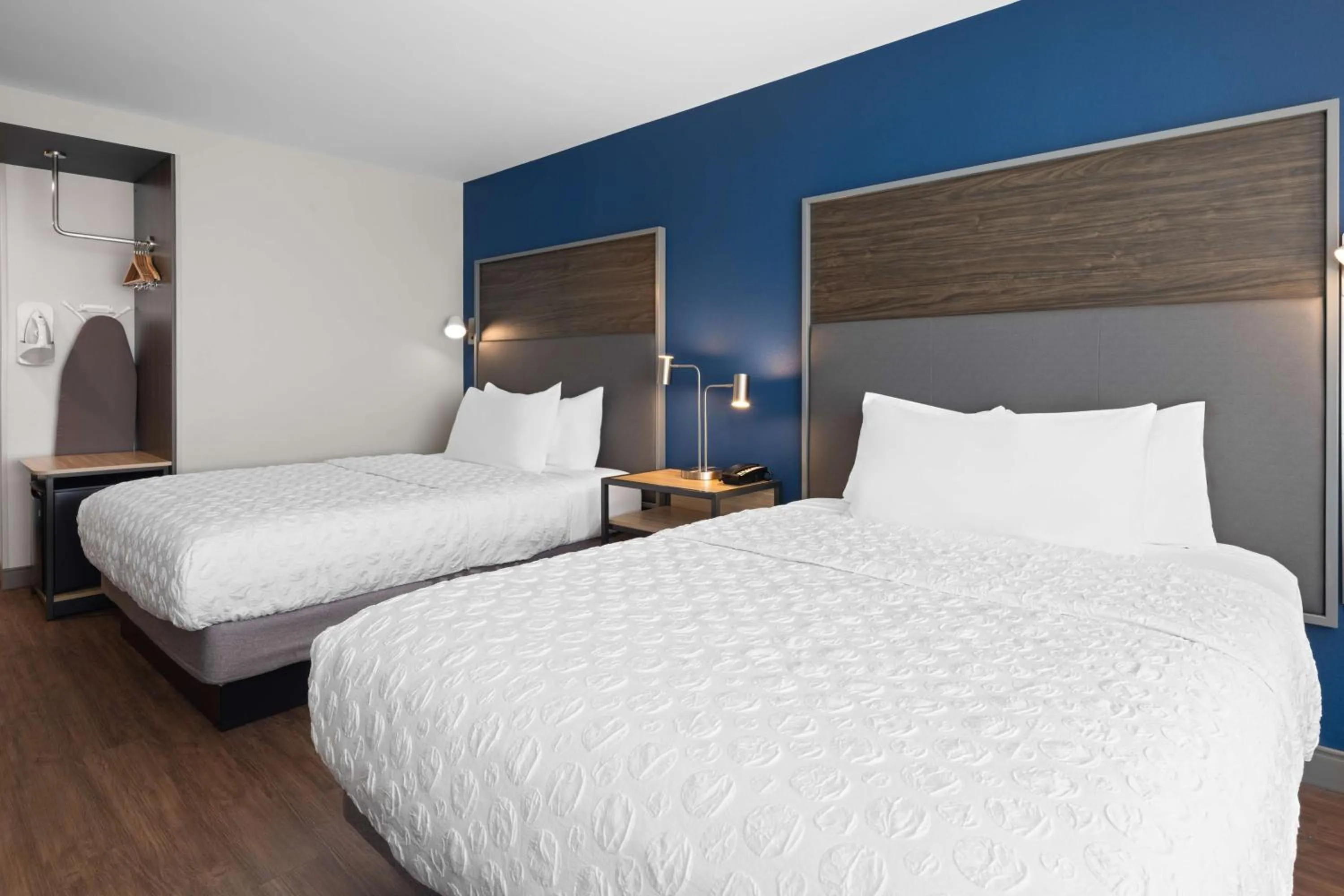 Queen Room with Two Queen Beds and Walk-In Shower in Tru By Hilton Wisconsin Dells