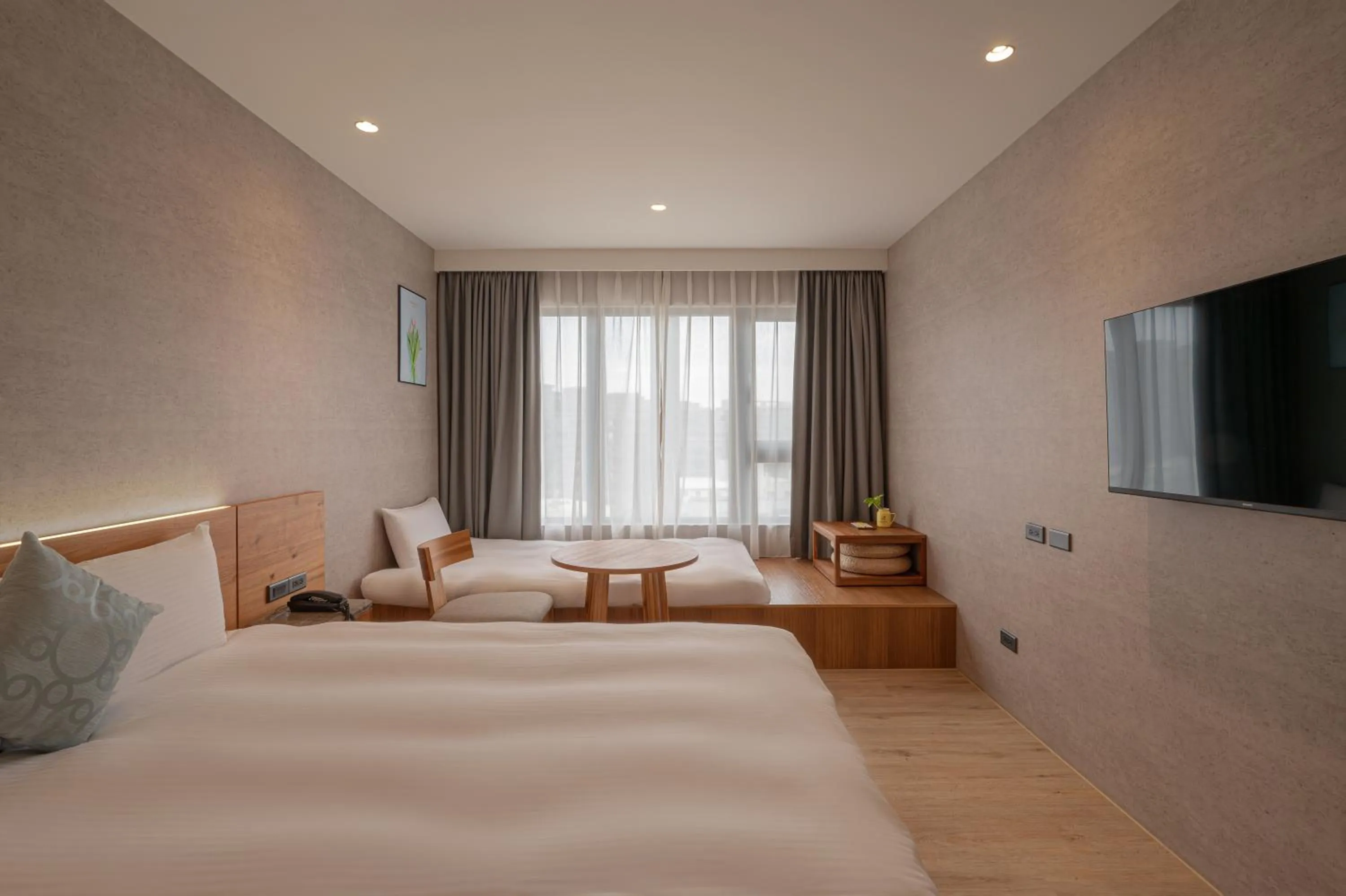 Standard Triple Room in In Joy Hotel