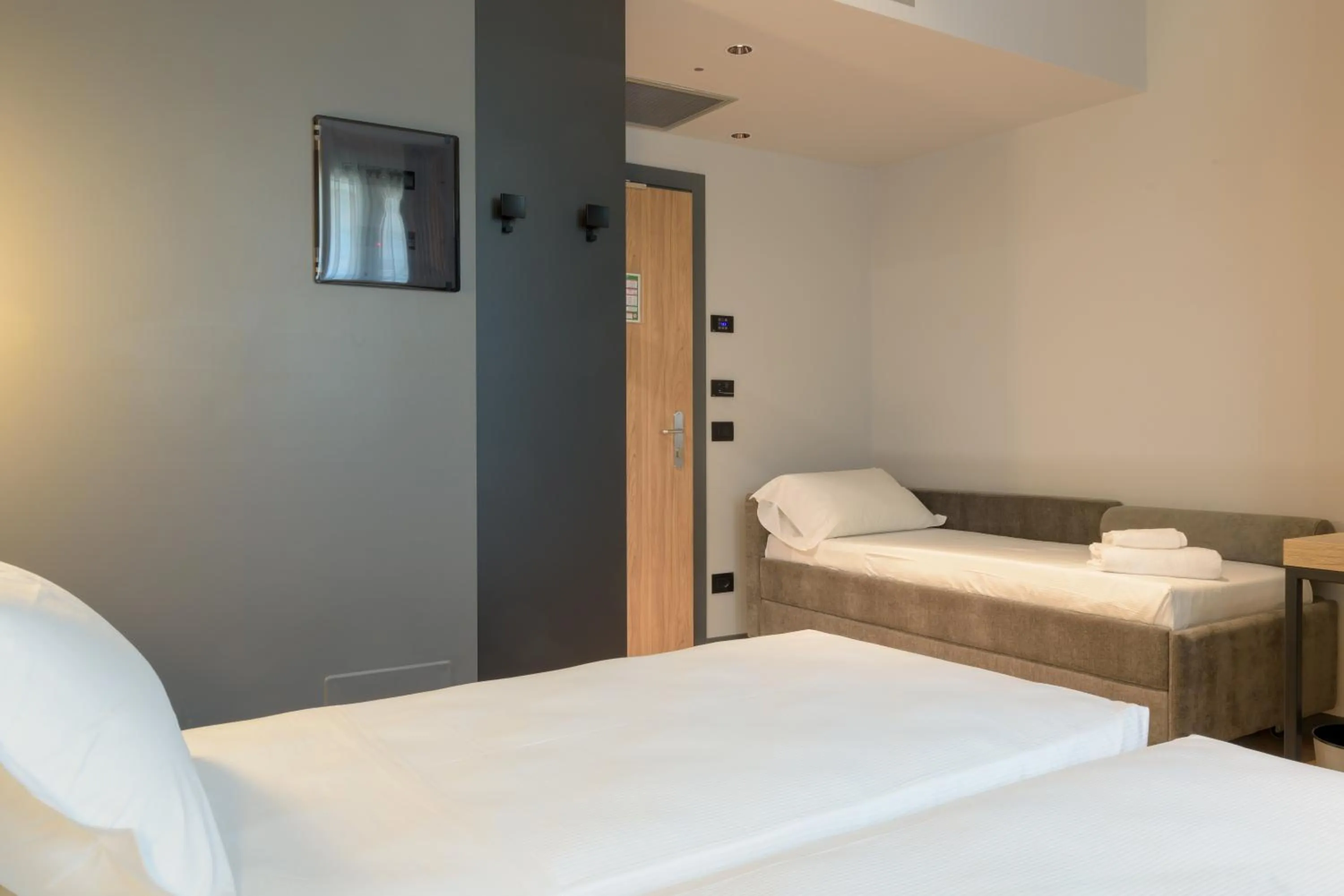 Classic Triple Room in Hotel Leonessa