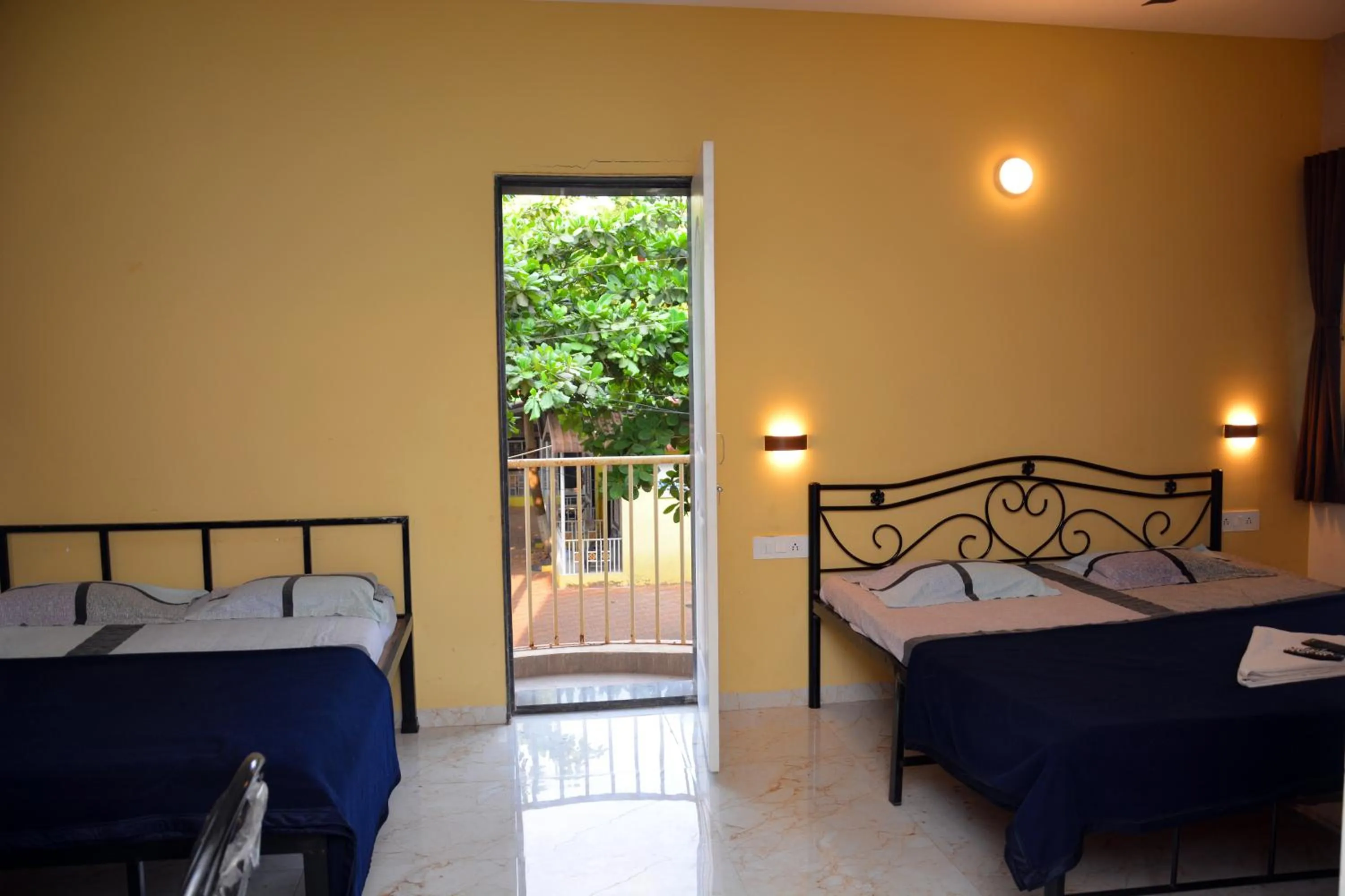 Quadruple Room with Balcony in Shree Swami Samarth Resort