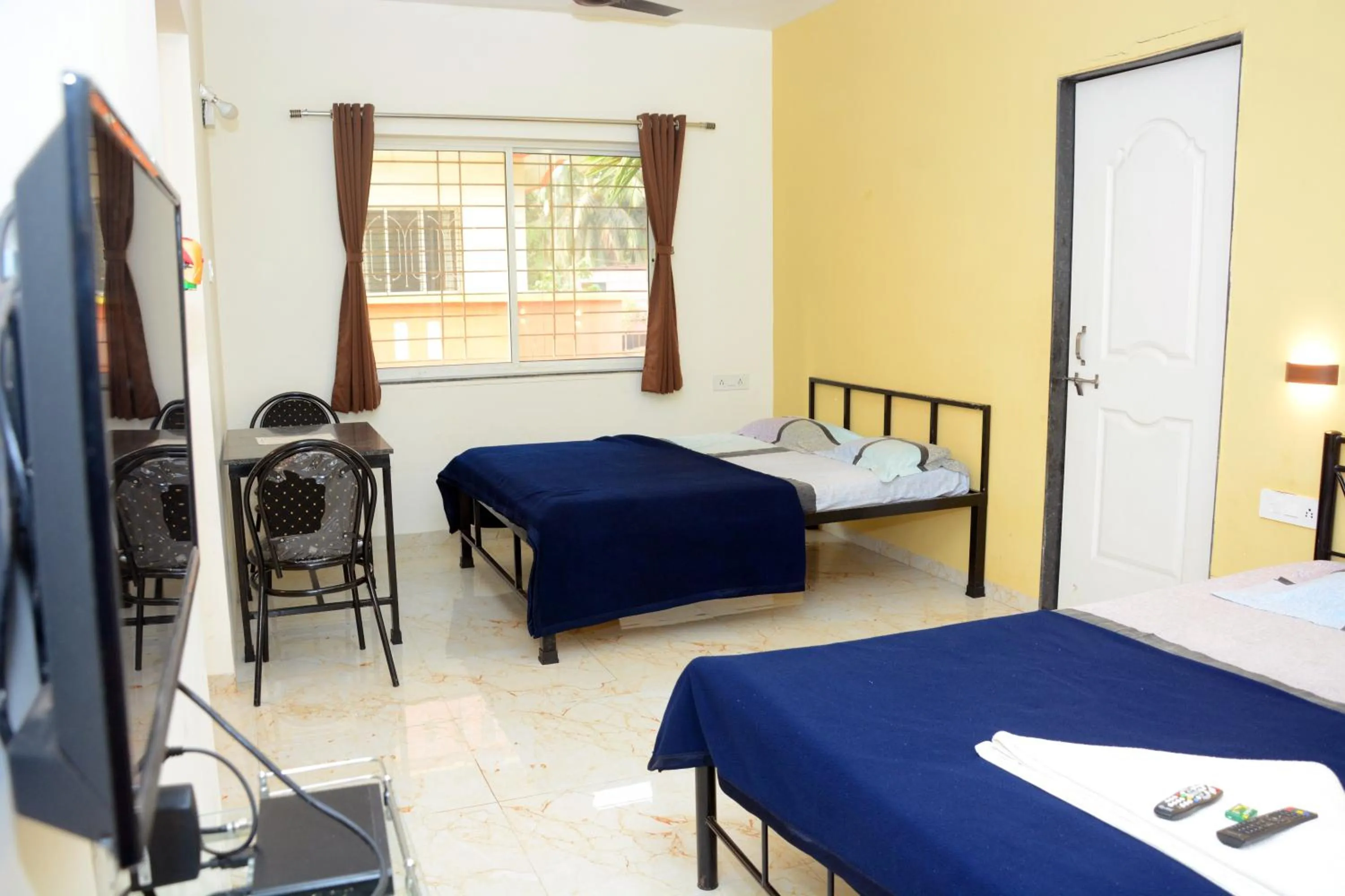 Quadruple Room with Balcony in Shree Swami Samarth Resort