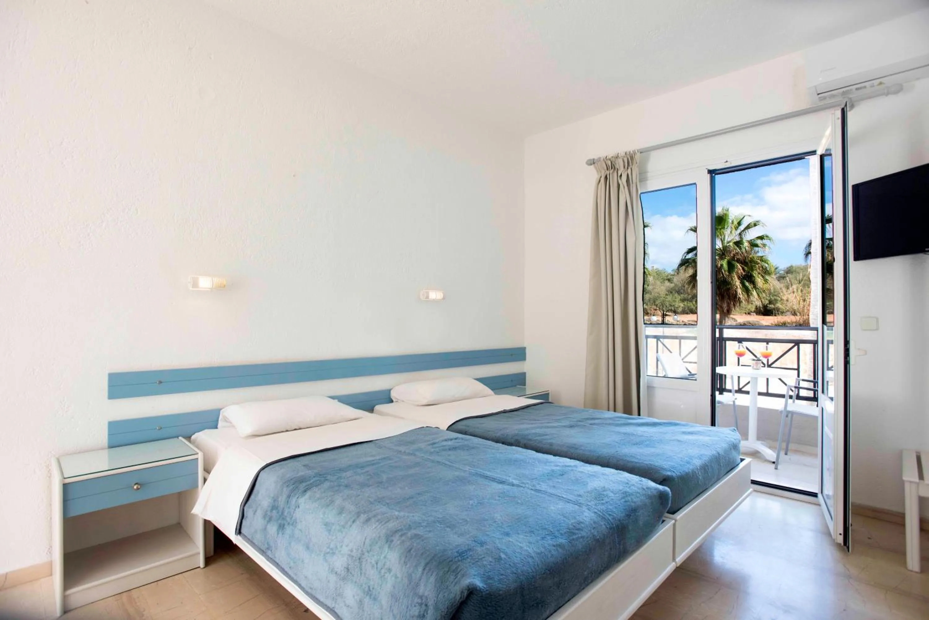 Standard Twin/Double Room with Side Sea View in Aeolos Beach Resort