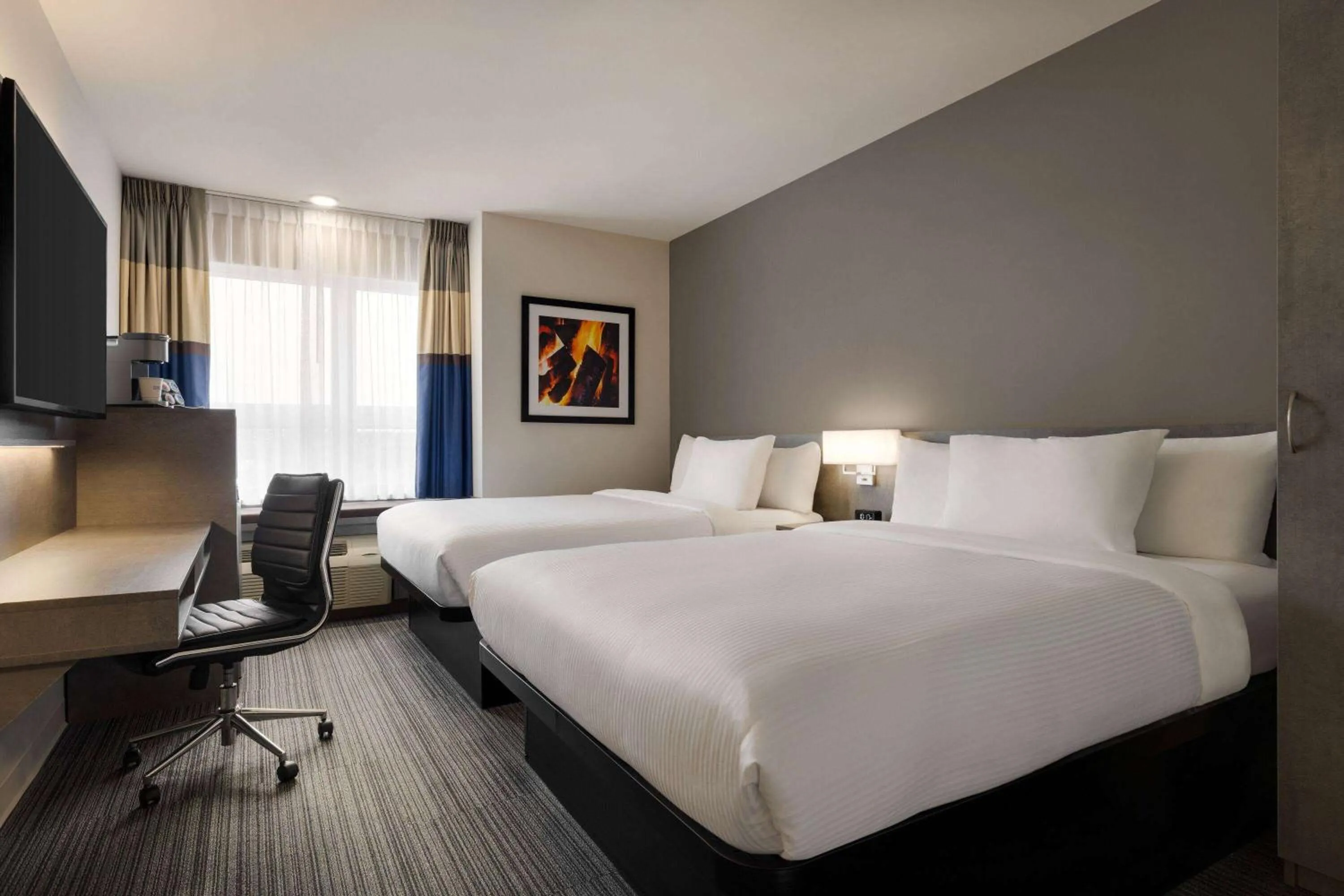 Queen Room with Two Queen Beds - Non-Smoking in Microtel Inn & Suites by Wyndham Boisbriand