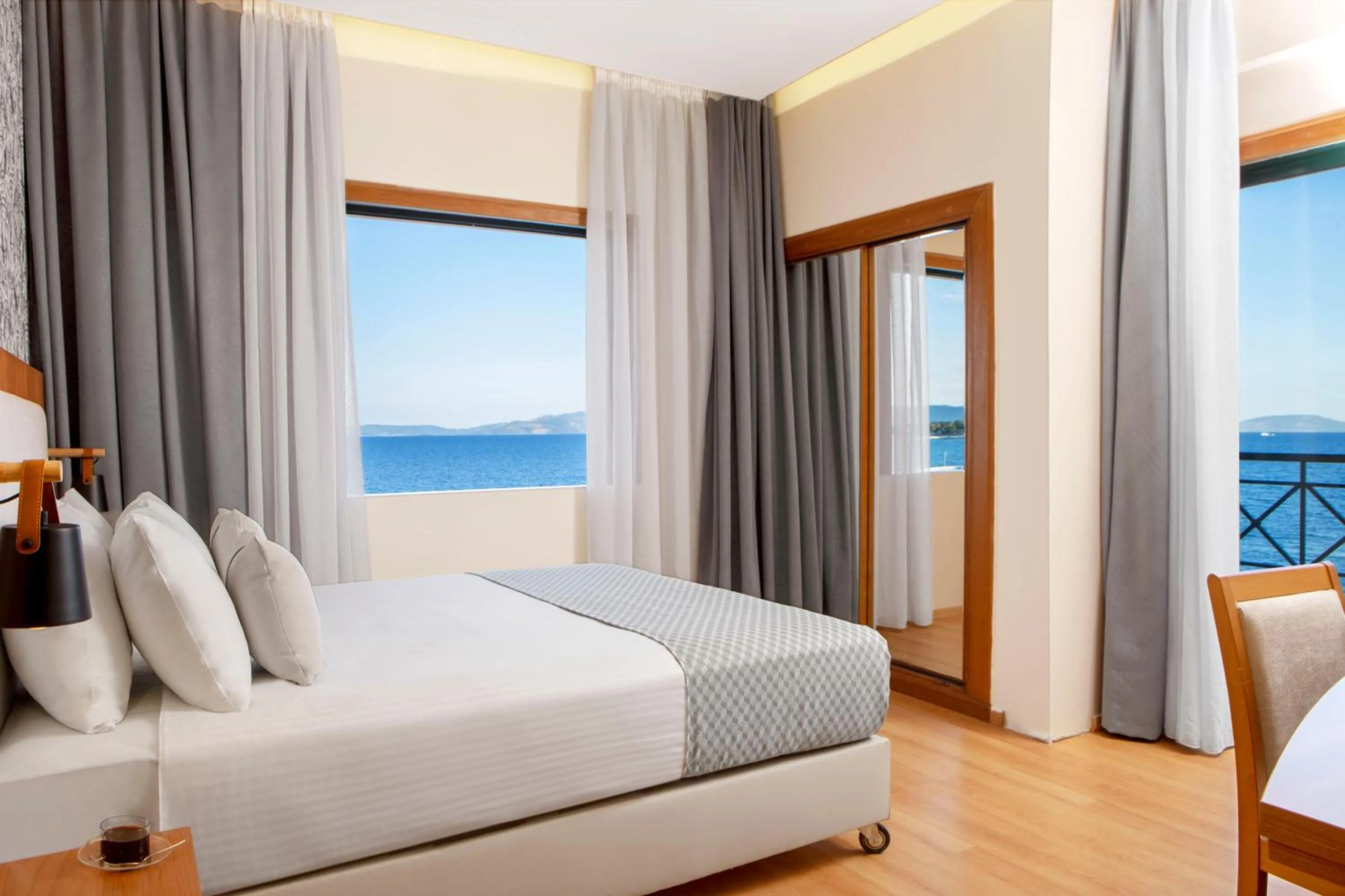Premium Suite with Side Sea View in Zeus Essence Ramada by Wyndham Athens