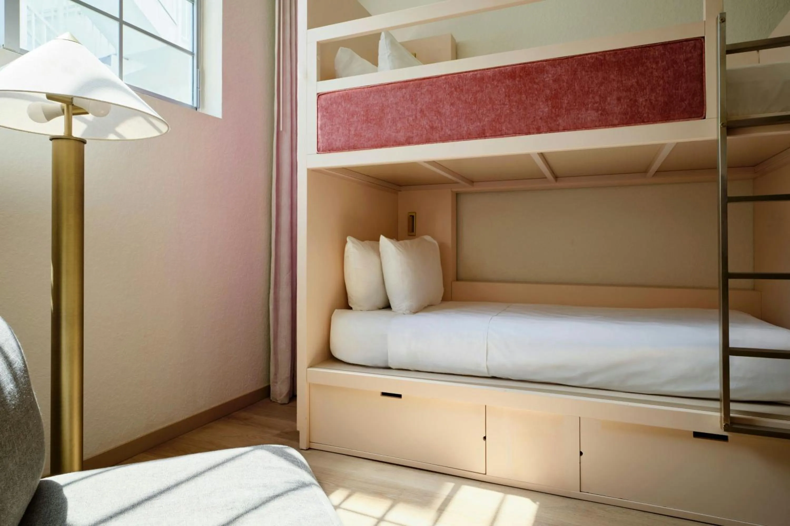 Triple Bunk Room with Three Twin Bunk Beds and Pool View in FOUND Hotels, Miami Beach, Series by Marriott