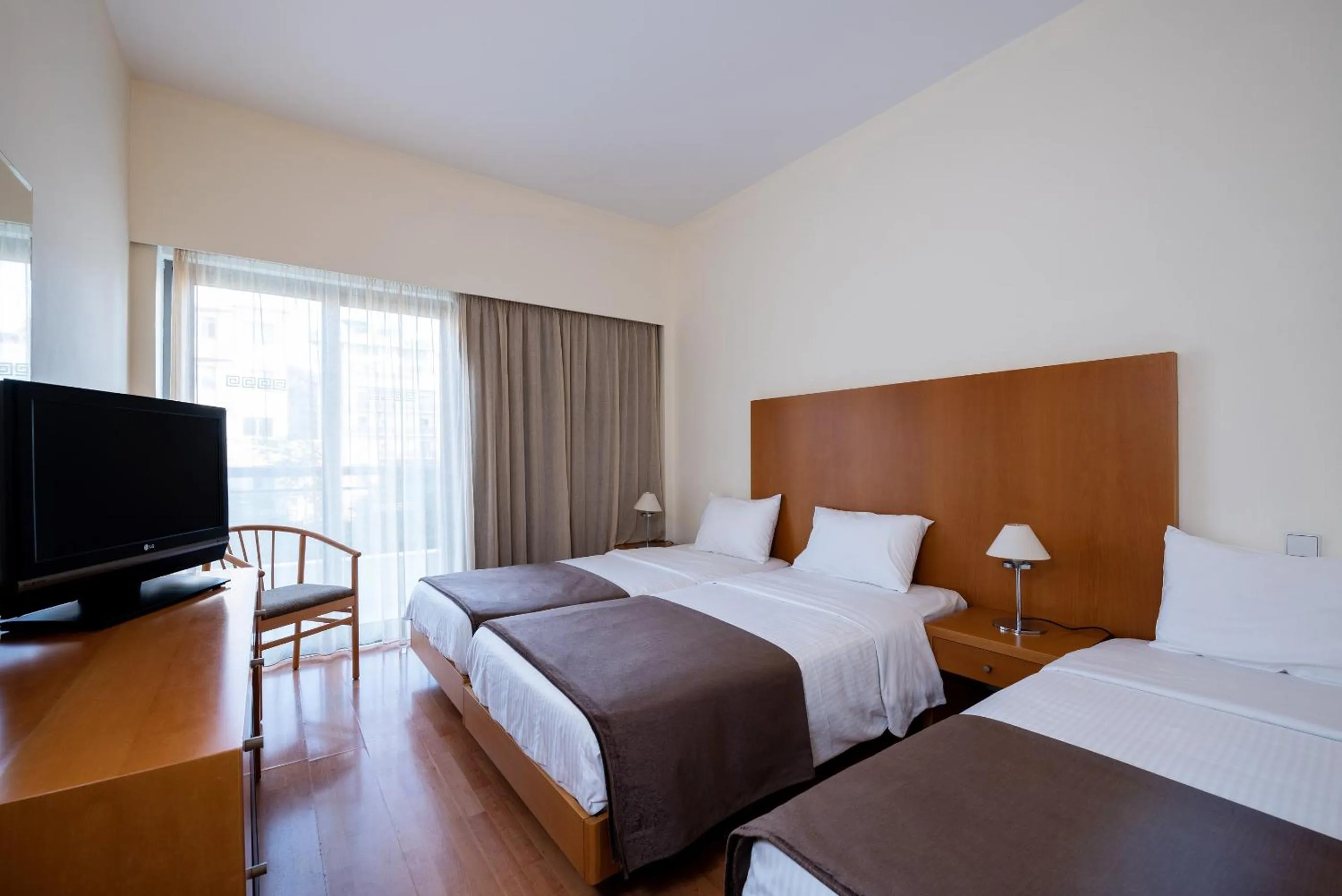 Triple Room in Angela Downtown Hotel