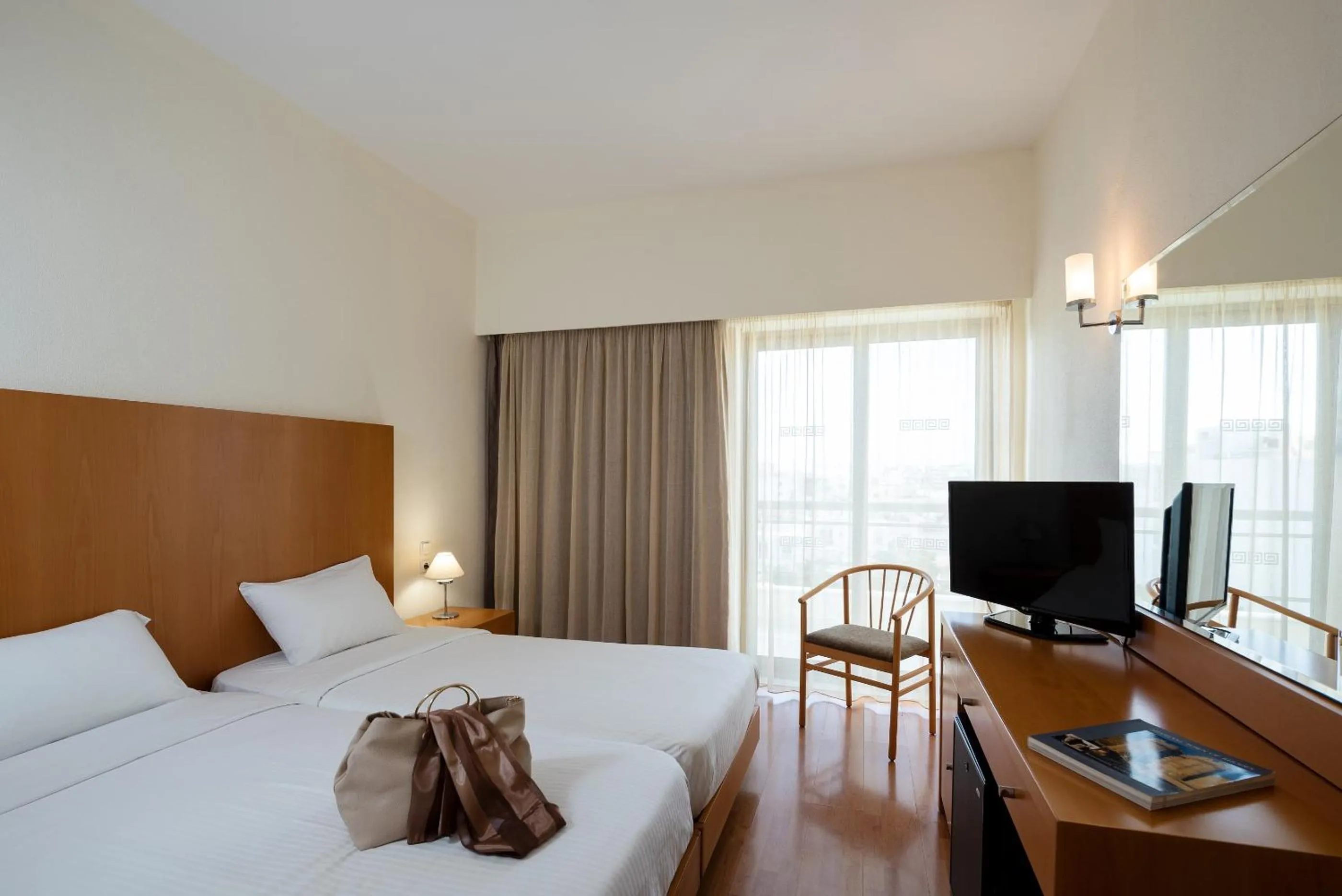 Classic Twin Room with Pool View in Angela Downtown Hotel