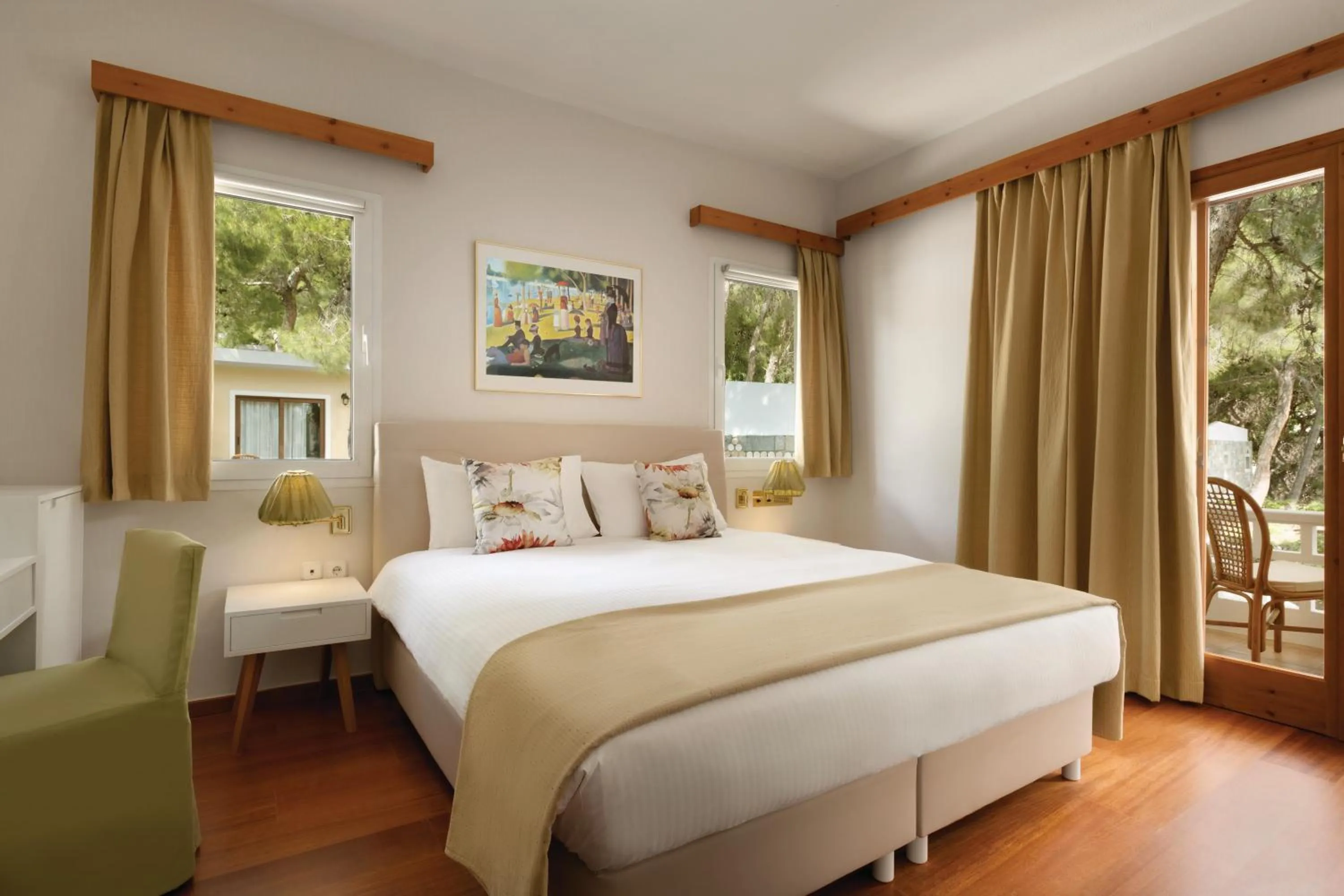 Executive One-Bedroom Junior Suite with Garden View in Wyndham Loutraki Poseidon Resort
