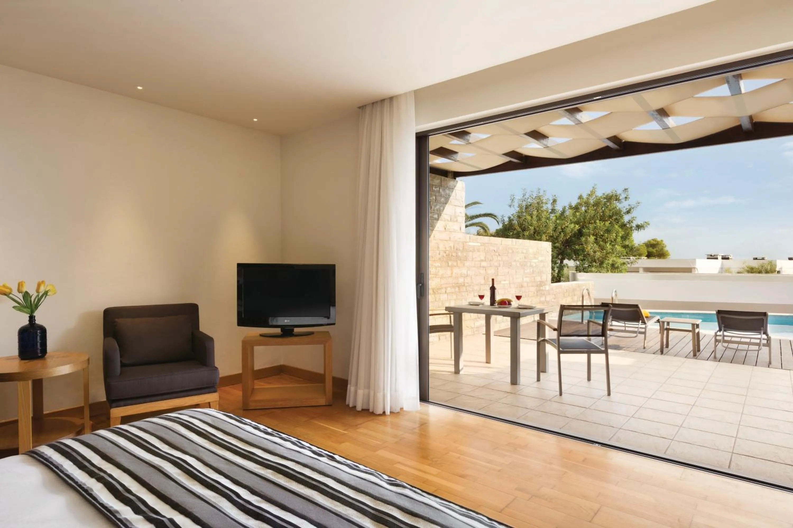 Deluxe Junior Suite with Private Pool and Garden View in Wyndham Loutraki Poseidon Resort