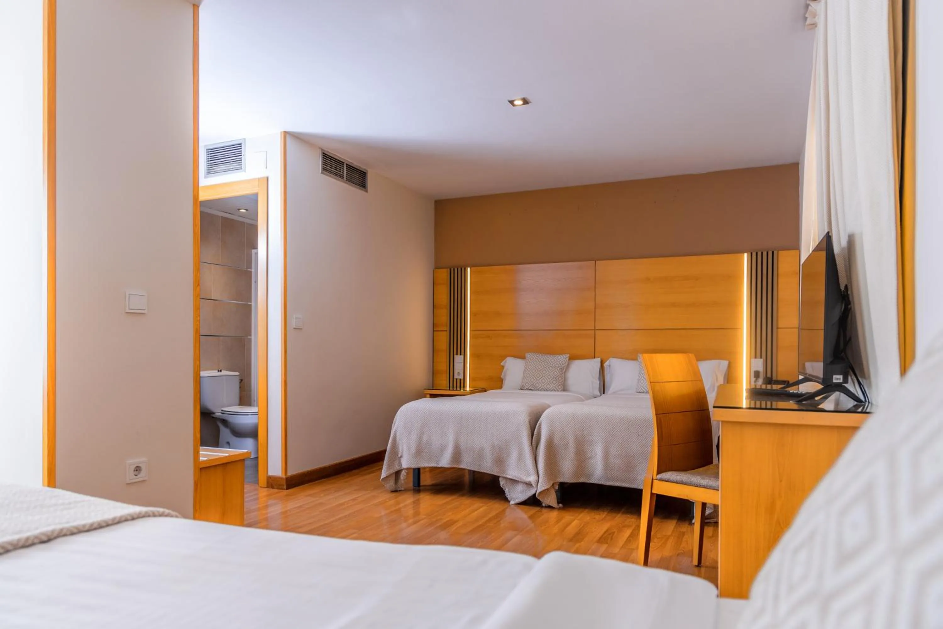 Triple Room in Hotel Serrano