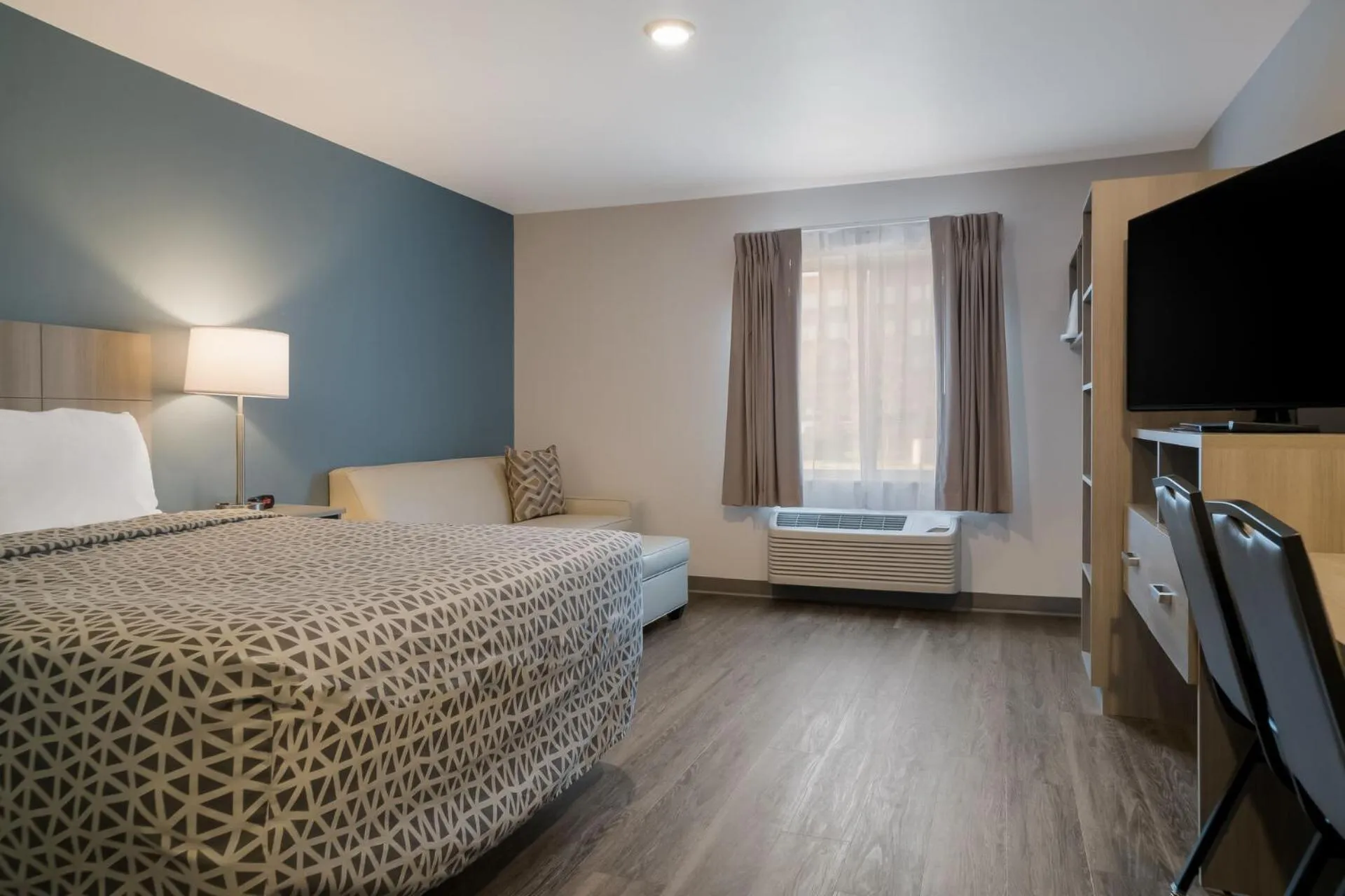 QUEEN SUITE WITH SOFA/DISHWASHER (DISHES/COOKWARE INCLUDED) in WoodSpring Suites Detroit Sterling Heights