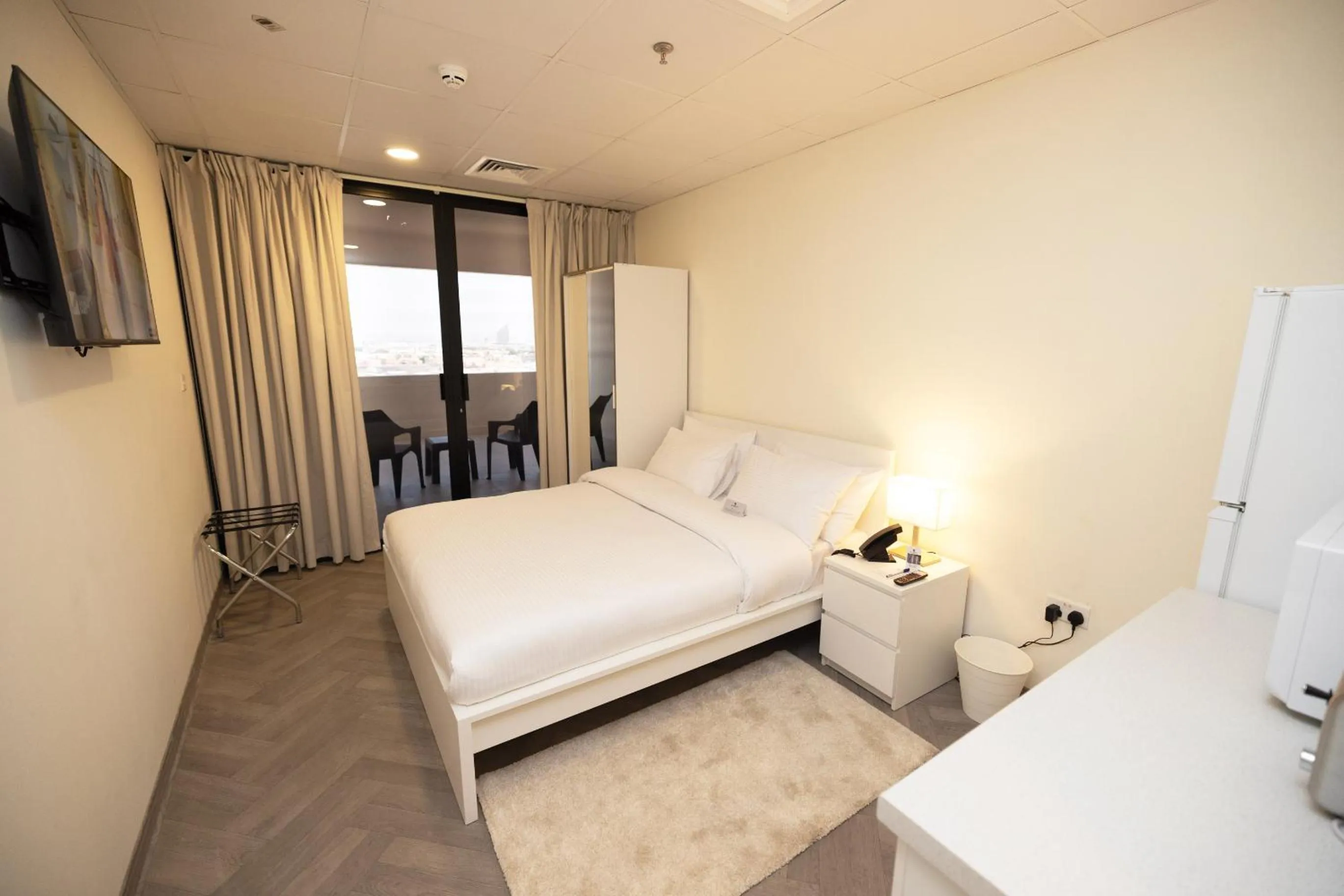 Superior Room City View with Balcony in Riggae Tower Hotel