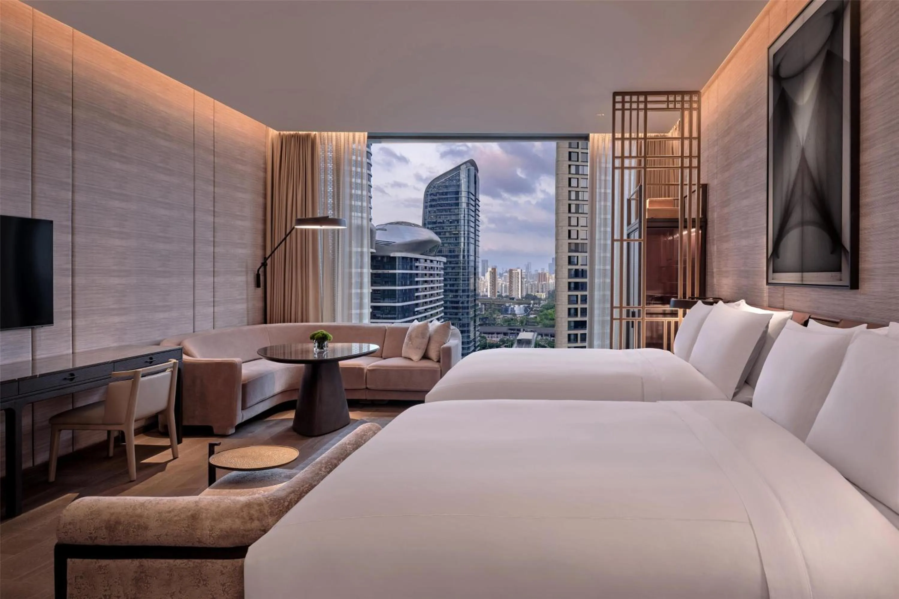 Deluxe Twin Room in Conrad Shenzhen, the first art museum hotel in Greater Bay Area with the stunning bay and sunset view in the hotel terrace