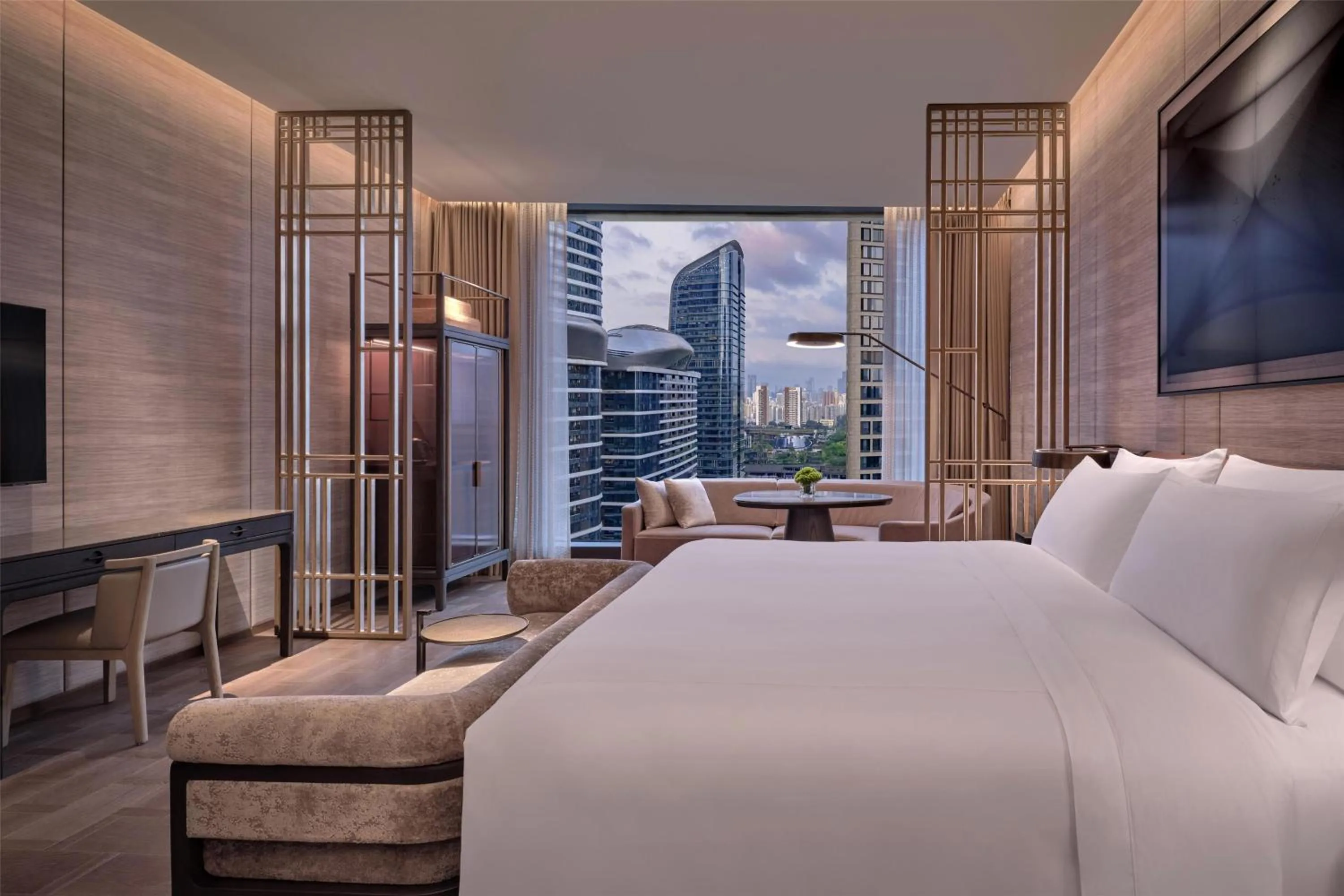 Deluxe King Room in Conrad Shenzhen, the first art museum hotel in Greater Bay Area with the stunning bay and sunset view in the hotel terrace