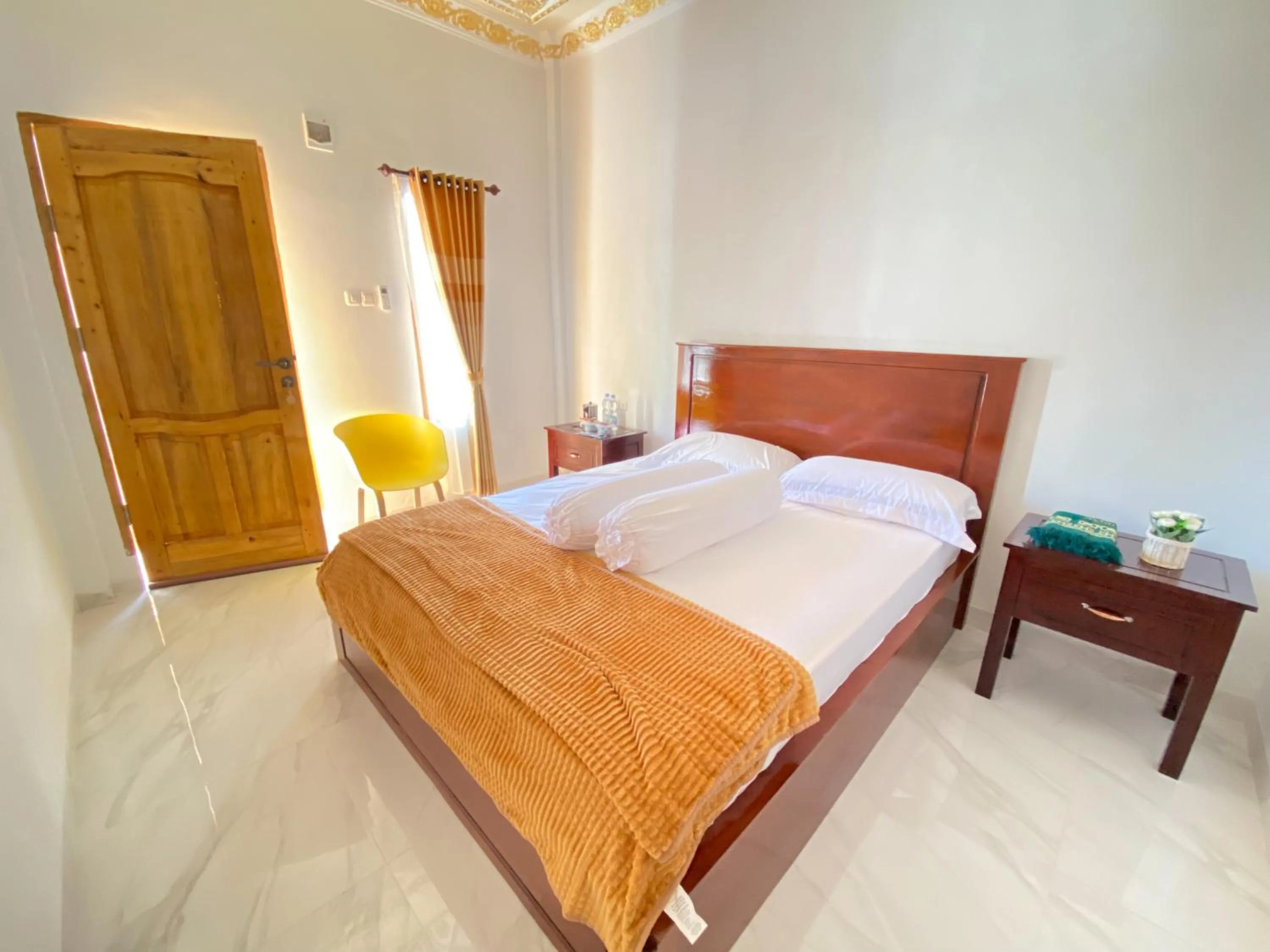 Deluxe Room in Rumah Windy Guest House Bira